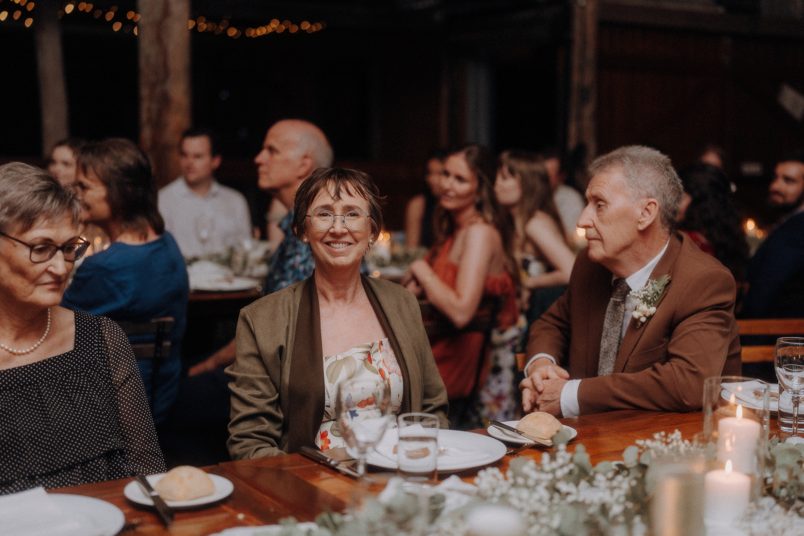 A group of people sitting at a table.